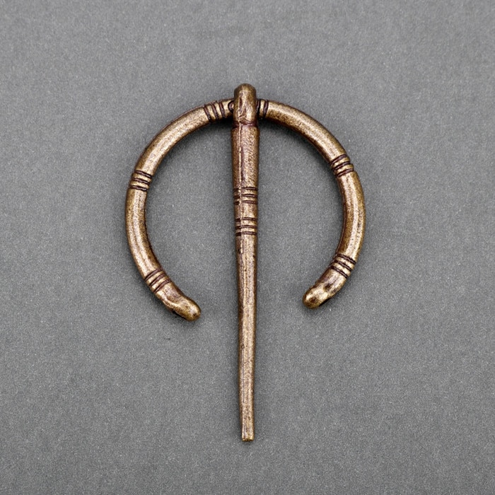bronze horseshoe brooch